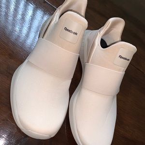 Tan Reebok slip-on tennis shoes